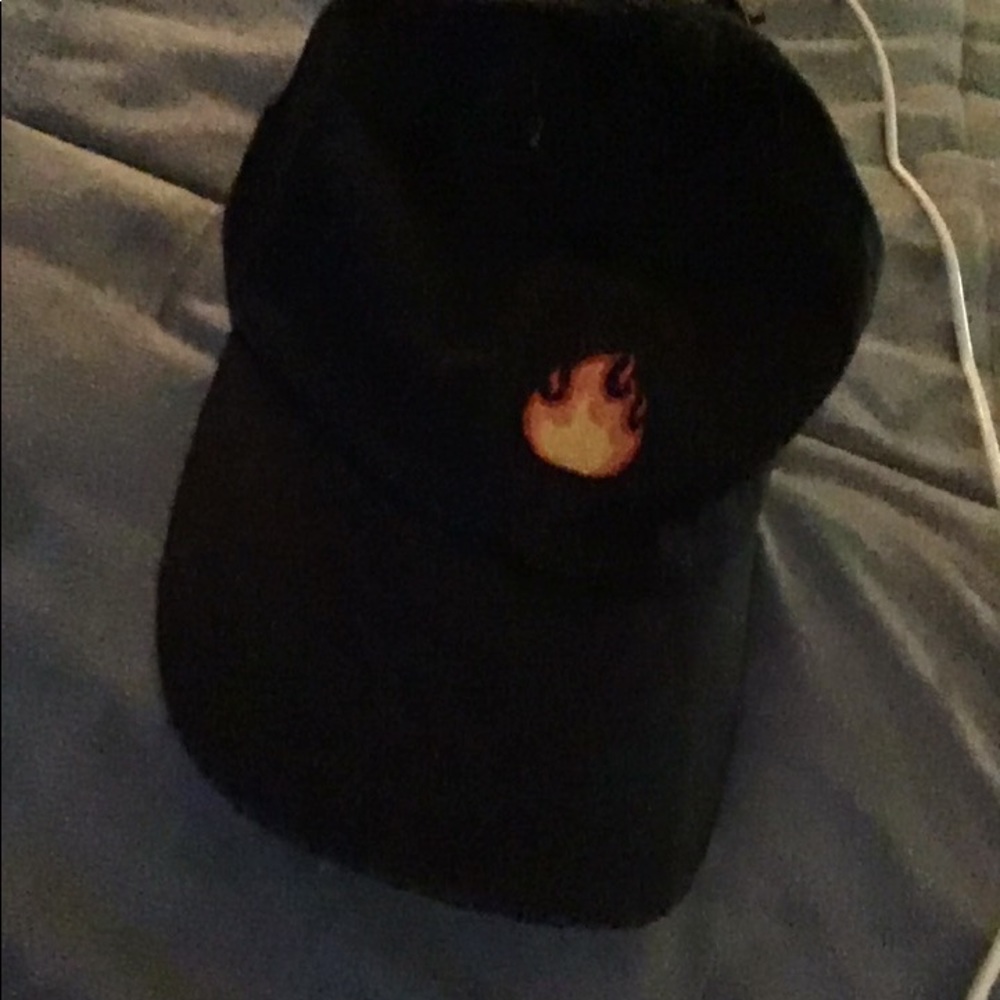 Hat with fire emblem.